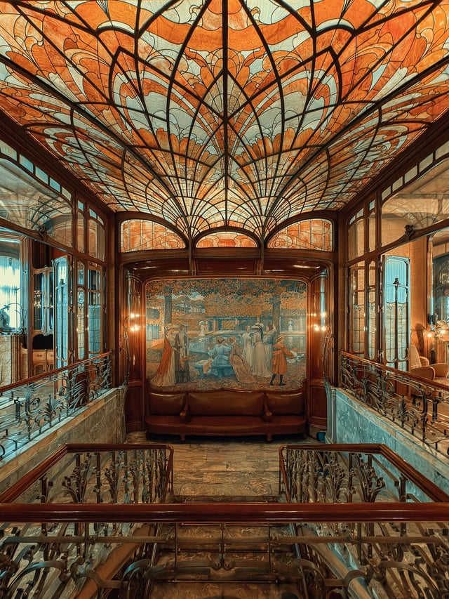 Stained-glass ceiling over the staircase in Hôtel Solvay, a historic Art Nouveau townhouse designed by Victor Horta and built between 1895 and 1900. Brussels, Belgium.
