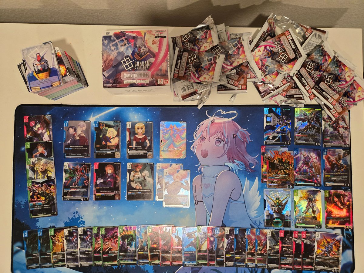 Thank you <a href="/TenshiHazuki/">Tenshi-Tan 天使 VT</a> for being with me in spirit and blessing my Gundam packs. I pulled the extremely rare card "Overflowing Affection," featuring everyone's fav pink hair idol. I know you think Gundam is nerdy, so I spread out the cute girl (and boy) cards for you to oggle.