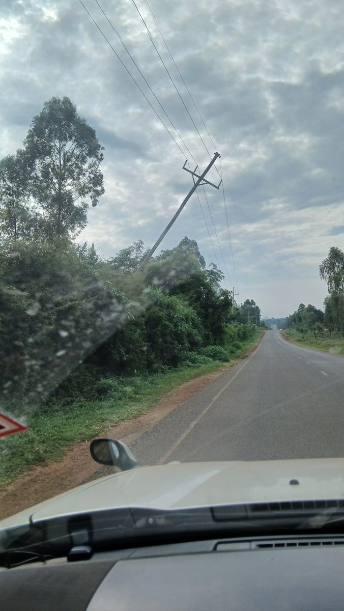 otienowill's tweet photo. This electric pole inside Got Osimbo Girls along the Sigomre–Ugunja Road has been hanging dangerously for over six months ; a silent threat to schoolchildren. Two weeks ago, the current Energy CS, a former MP, landed in a helicopter barely two kilometres away to attend a birthday party, yet somehow missed a live electrical hazard in a girls’ school. This is the rot: leaders who can descend from the sky for celebrations but cannot walk into reality to fix dangers that could kill children. When power is used for entrances and selfies instead of responsibility, negligence stops being accidental but it becomes policy.