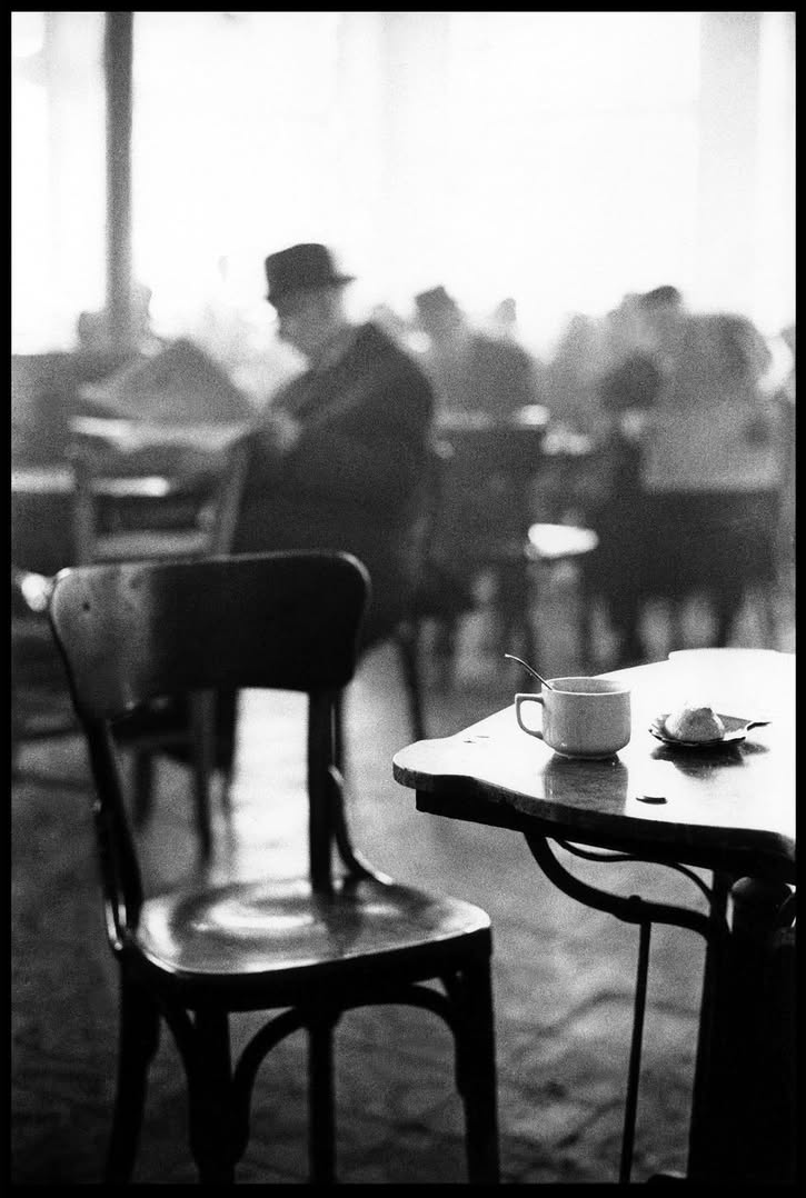 eyeonaxis's tweet photo. Scenes from a café in Kalamata. Greece, 1966 | Elliott Erwitt https://t.co/E1ccCtpG1k