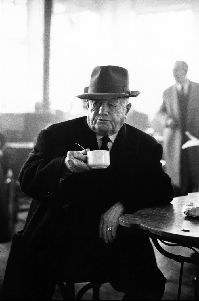 eyeonaxis's tweet photo. Scenes from a café in Kalamata. Greece, 1966 | Elliott Erwitt https://t.co/E1ccCtpG1k