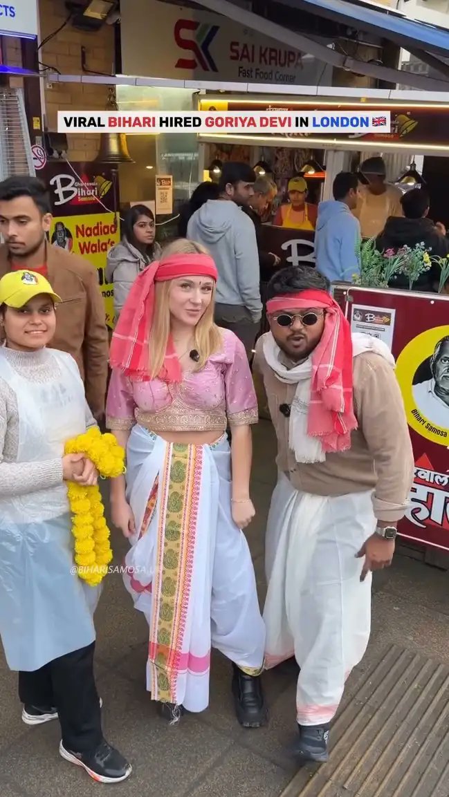 Bharatramsena's tweet image. “We’ll bring the girl from London,
play the DJ all night long” 

These lines perfectly fit the London-based Bihari samosa seller going viral these days.

What’s special this time is that
he’s got a Goriya Devi with him 
making samosas with full energy,
serving customers, and…