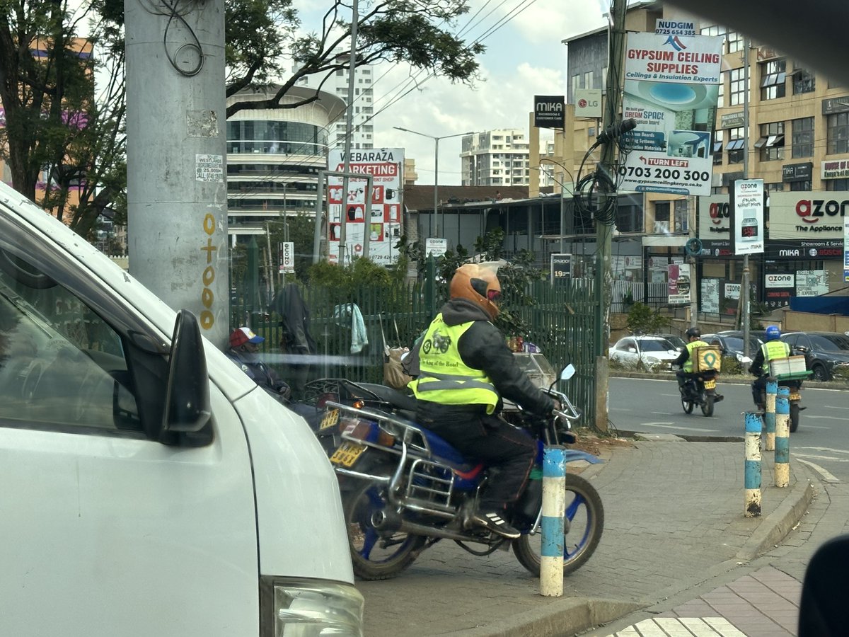 Alfayaz11's tweet photo. Dear @ntsa_kenya 
You guys are brilliant at reminding parents to ensure children wear helmets when boarding boda bodas. 

But when it comes to reckless riding, open impunity and actual enforcement, that’s clearly where the line is drawn.

Help us understand policy, could you kindly confirm whether riding on the wrong side of the road, using pavements as highways, crossing expressways and major roads, and treating zebra crossings like free-for-all lanes are now officially permitted for boda bodas?

If enforcement ends at posters, just say so.
Safety is not selective.
#RoadSafety