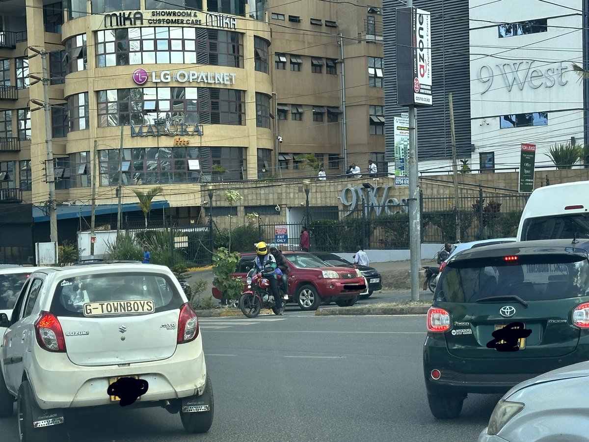 Alfayaz11's tweet photo. Dear @ntsa_kenya 
You guys are brilliant at reminding parents to ensure children wear helmets when boarding boda bodas. 

But when it comes to reckless riding, open impunity and actual enforcement, that’s clearly where the line is drawn.

Help us understand policy, could you kindly confirm whether riding on the wrong side of the road, using pavements as highways, crossing expressways and major roads, and treating zebra crossings like free-for-all lanes are now officially permitted for boda bodas?

If enforcement ends at posters, just say so.
Safety is not selective.
#RoadSafety