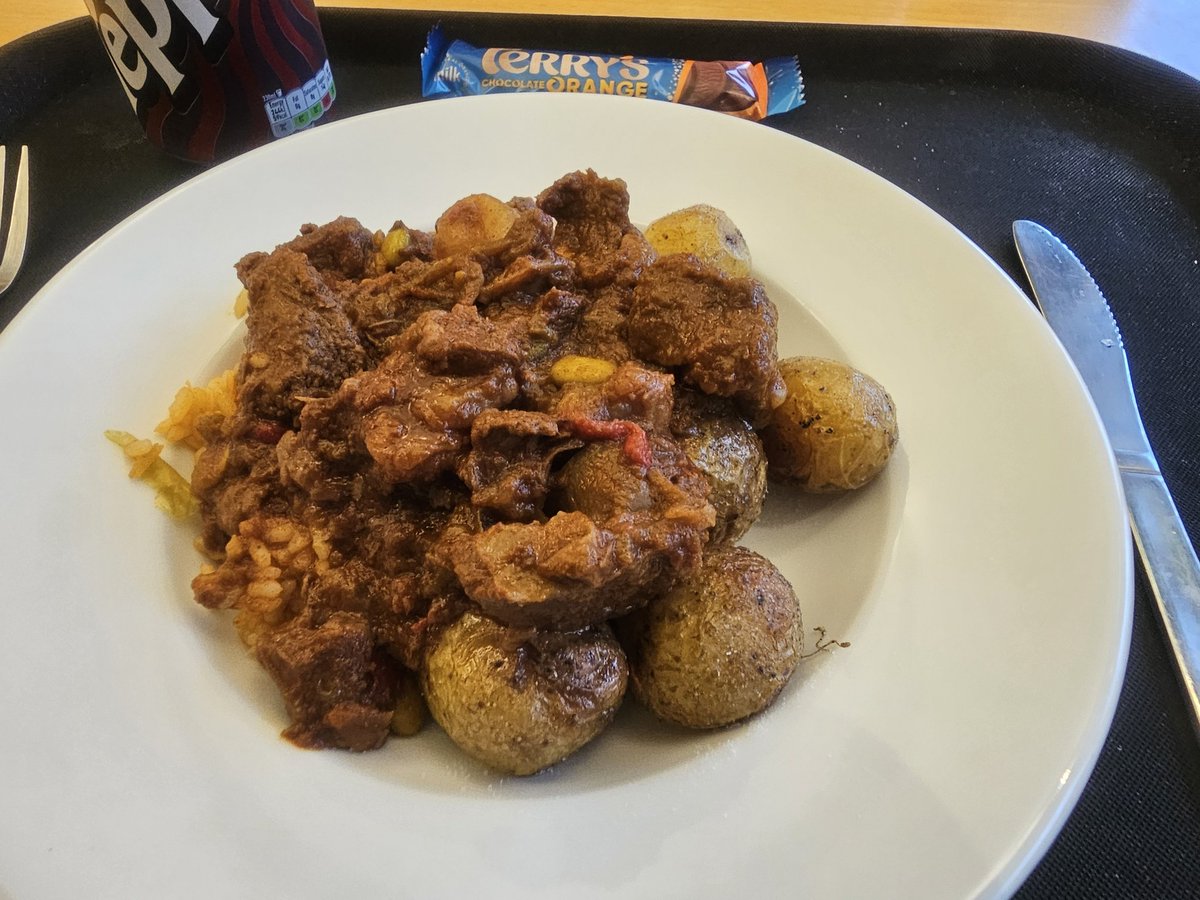 Beef gouLASH with potatoes and rice and a cheeky bar of John Terrys chocolate orange