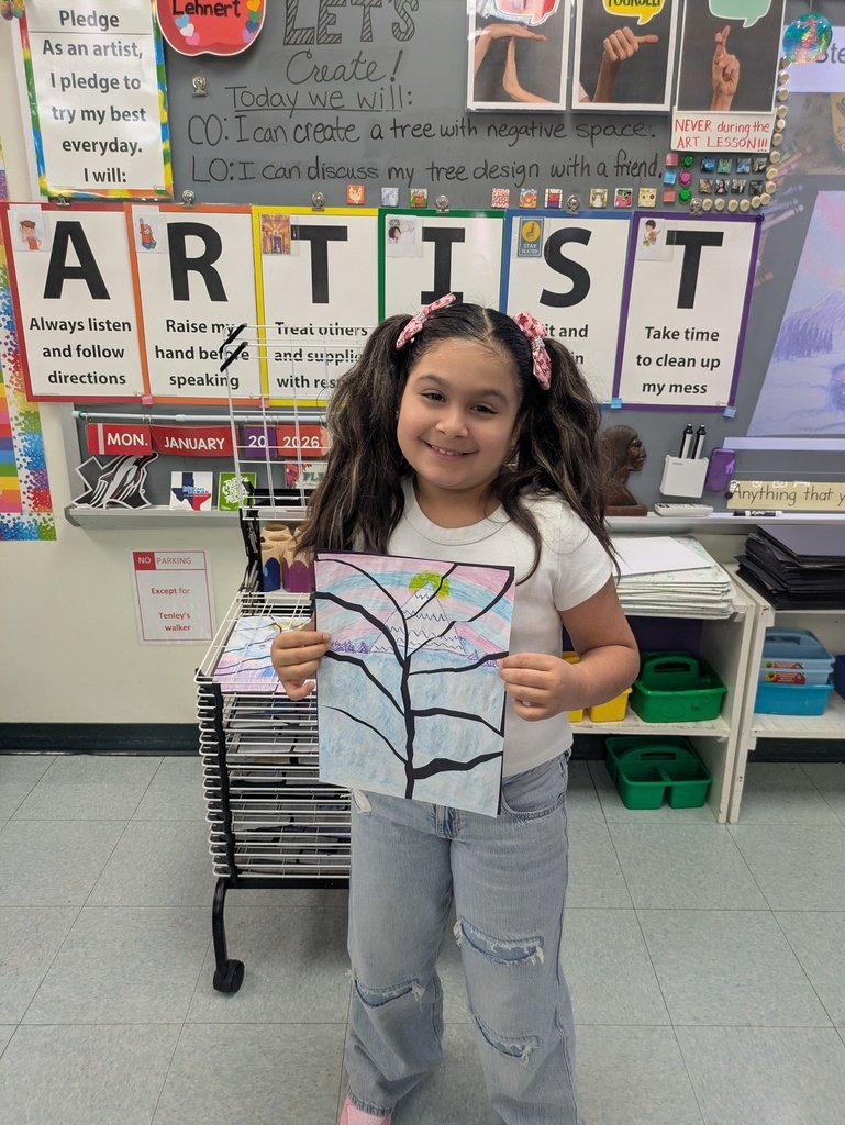 Students cut the winter landscape they created previously to create a tree in negative space. They turned out beautiful!!