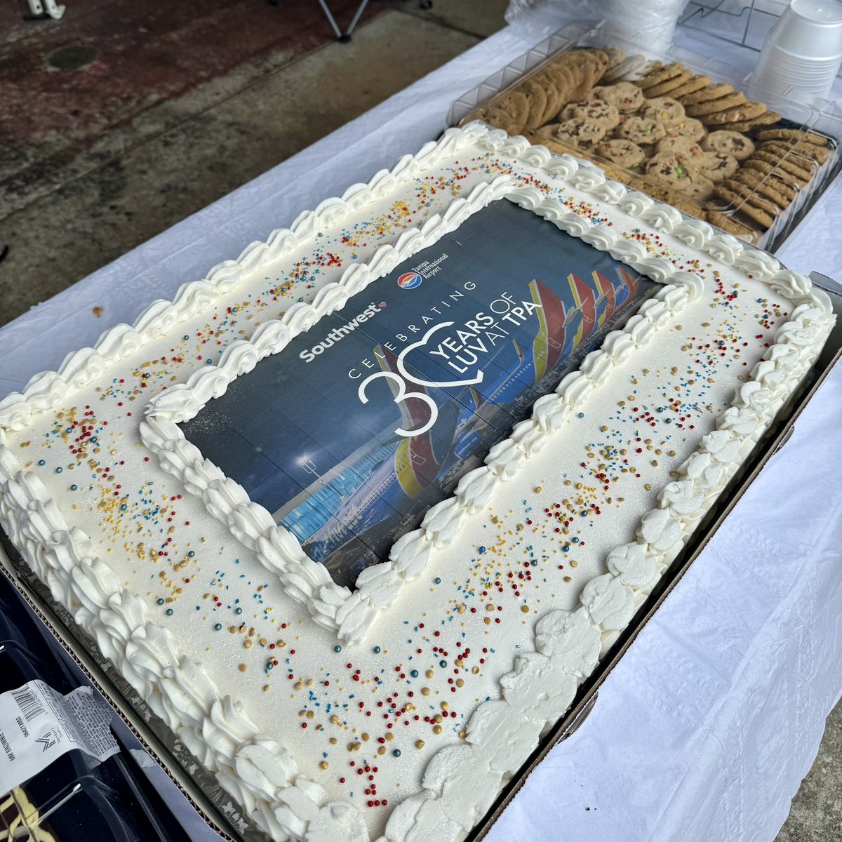 FlyTPA's tweet photo. 30 YEARS OF LUV AT TPA! ❤️ 30 years ago today, our friends at @SouthwestAir launched their first flights from TPA, so we had to celebrate this big day with a special cake. Here’s to the next 30! ✈️ https://t.co/q7mxLRZETW