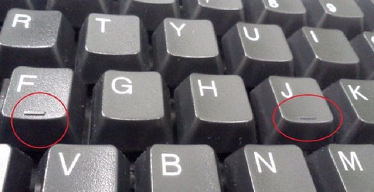 Why do the 'F' and 'J' keys on keyboards have bumps on them?