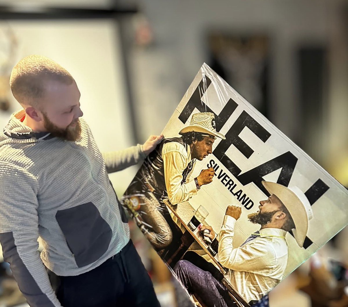 Iamsilverland's tweet photo. The artwork for my latest track? An impromptu wedding photo I captured in September. The person holding this canvas? My son. Who was just sat with his best mate having a deep conversation over a Guinness. That’s it. Epic 😎 

#art #canvas #son #musicproducer #heal https://t.co/Hb87VSOMN8