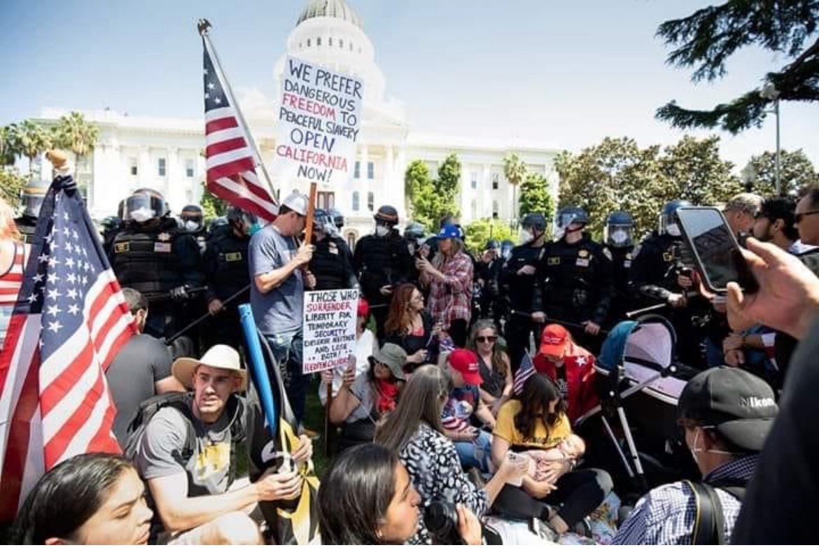 InformedMama209's tweet image. Authoritarian ?? Gavin Newsom has the audacity to talk while under his command riot officers were used against Californians peacefully protesting his extreme lockdowns May 1, 2020. They arrested 32 of us, including myself. The arresting officer telling me to “behave”, and zip…