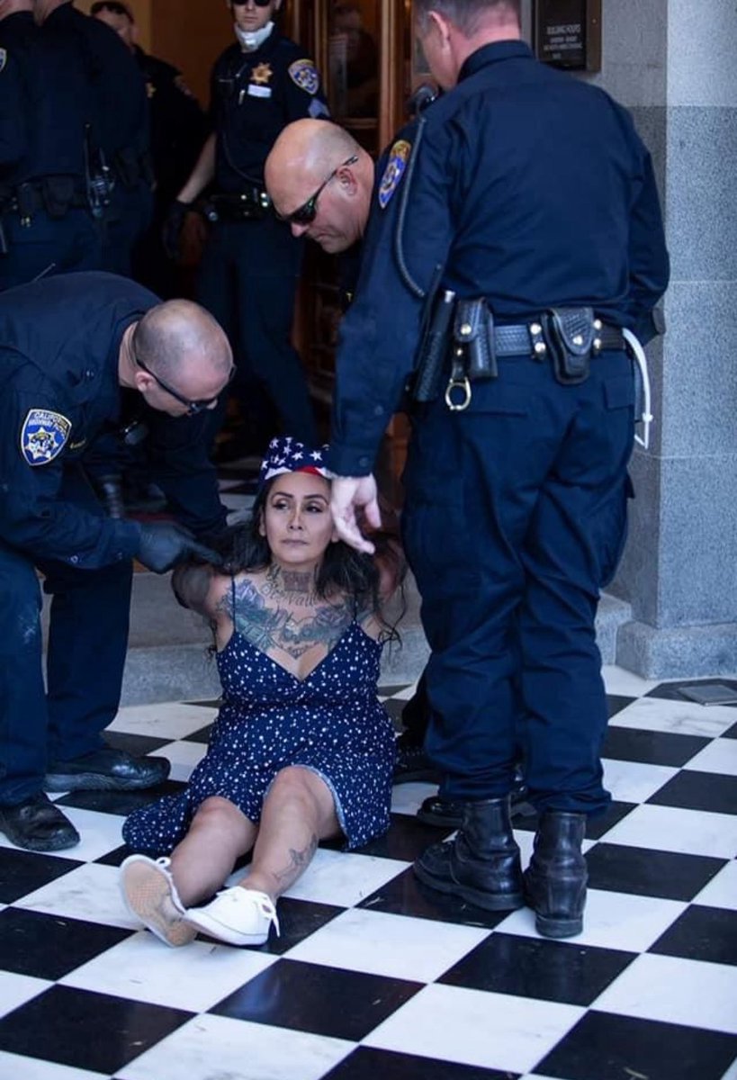 InformedMama209's tweet image. Authoritarian ?? Gavin Newsom has the audacity to talk while under his command riot officers were used against Californians peacefully protesting his extreme lockdowns May 1, 2020. They arrested 32 of us, including myself. The arresting officer telling me to “behave”, and zip…