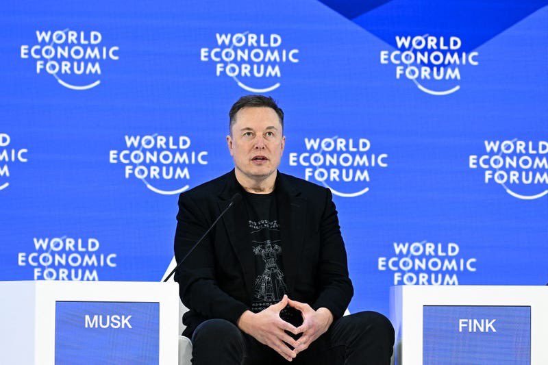argosaki's tweet image. Elon Musk’s Mind-Bending Davos Bombshells: 
AI Overlords by 2027, Robot Armies and Solar-Powered Space Domination! 🚀🤖

🧵 1/ 🚀 Elon Musk just dropped mind-blowing insights at his first-ever WEF Davos 2026 appearance! In a convo with BlackRock’s Larry Fink, he covered AI…