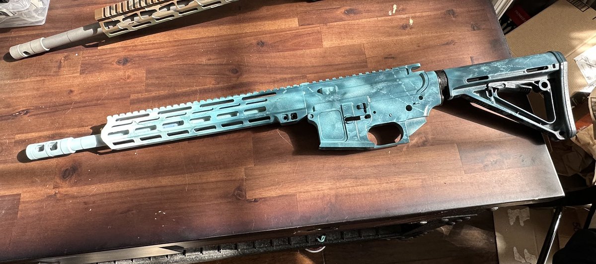 KragaxeArmoury's tweet photo. I’m blue da ba dee da ba die… Hah! My son says “Do a #Rainbow_6_Siege rifle in Black Ice. I had to go search, but challenge accepted! The camo one is my new #6mm_ARC.  Hopefully get to use them on some hogs this spring. https://t.co/DArdJNBiWS