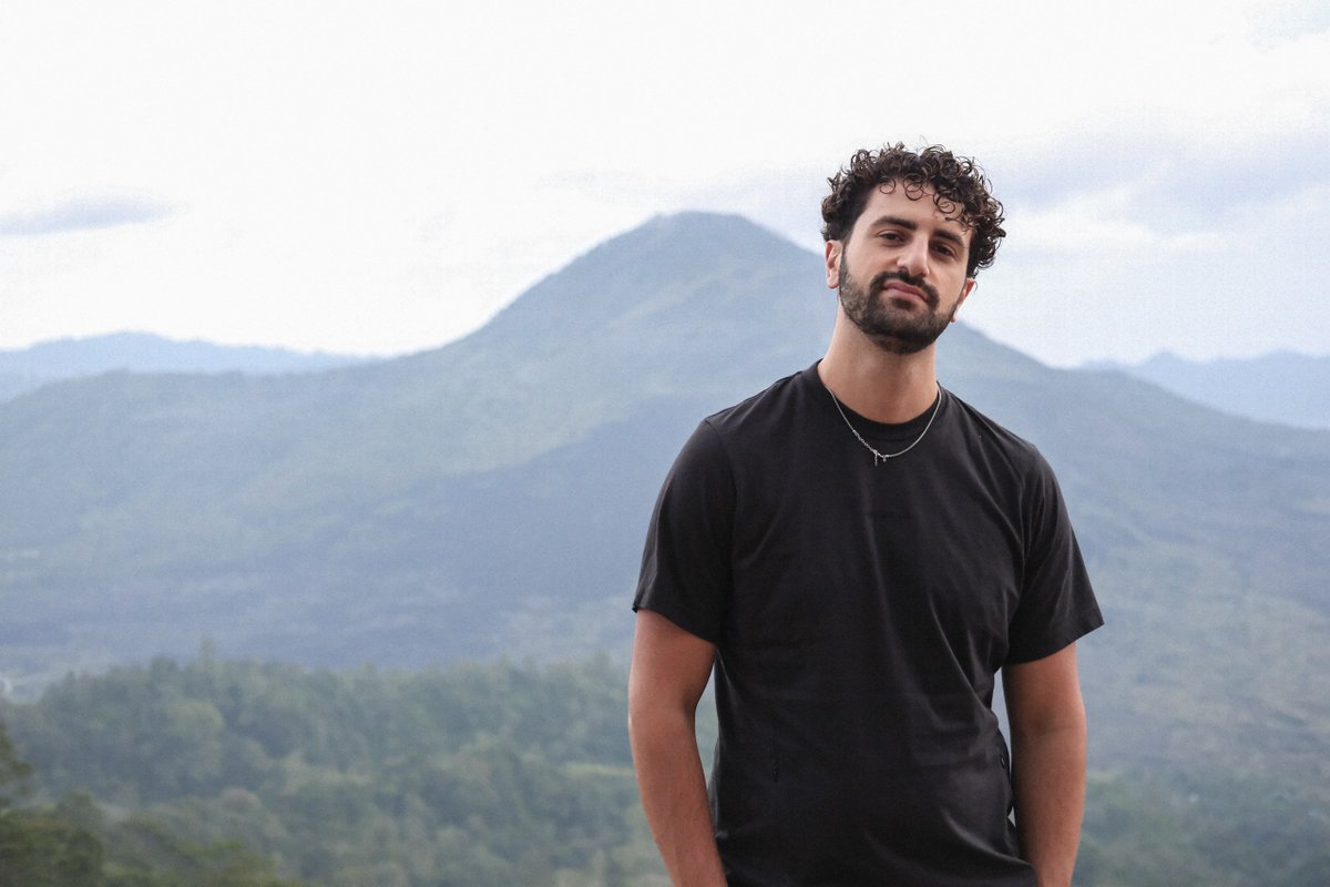 NanoBanana Prompt:
{
  subject: "human embodiment of a leading crosschain lending protocol",
  history: "Algorand largest DeFi protocol",
  backing: "backed by leading investors",
  metrics: { APY: "industry-leading" },

  appearance: {
    outfit: "black t-shirt",
    posture: