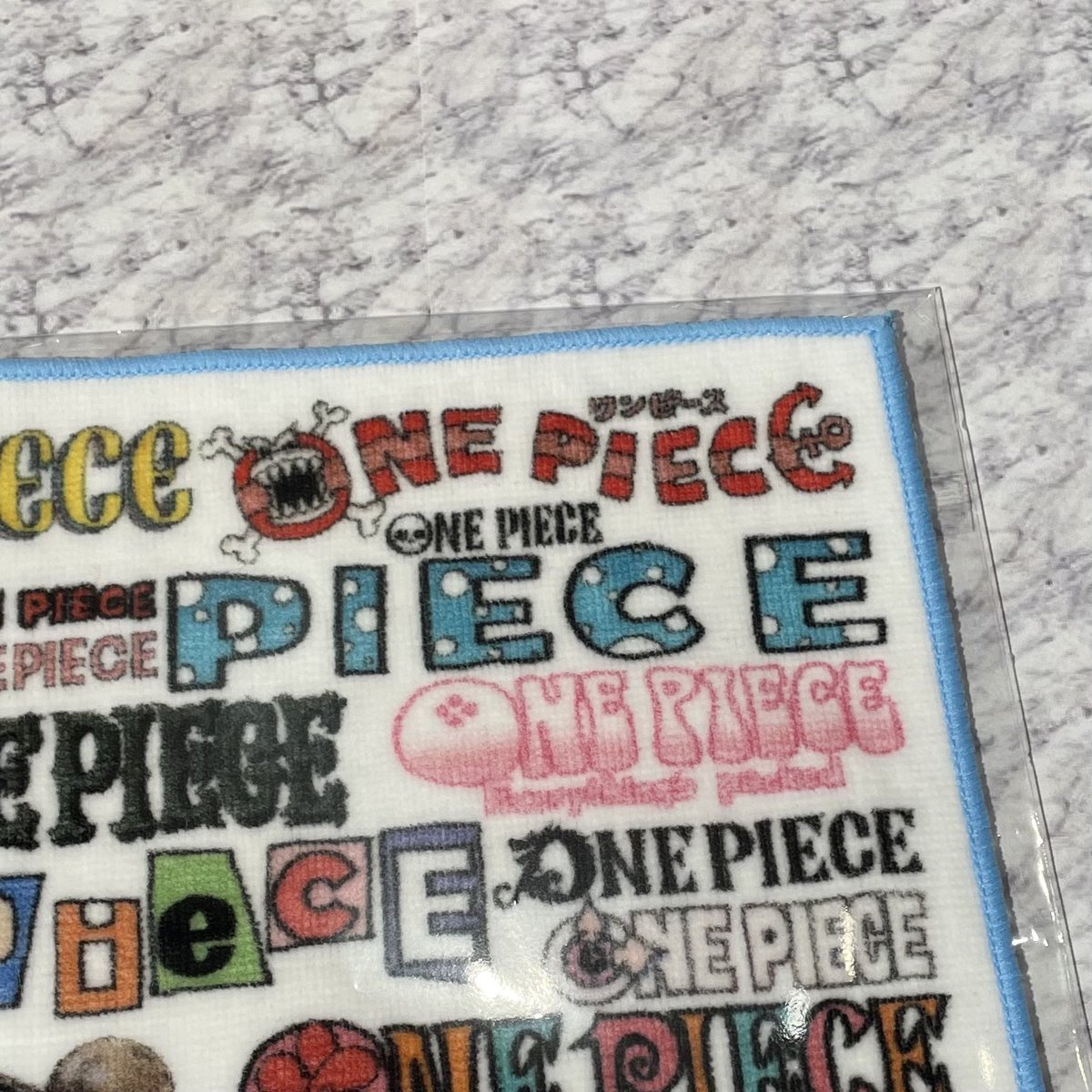 再入荷】原画商品 連載20周年記念 ロゴがいっぱいハンドタオル 770円