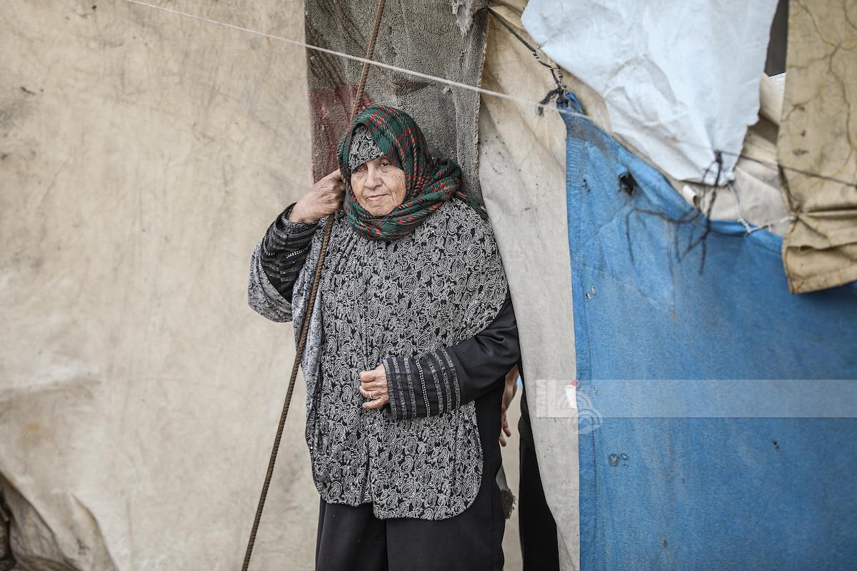 WAFANewsEnglish's tweet image. Displaced families inspect their tents after they were damaged by a powerful windstorm that struck a displacement camp in central Gaza, adding to the hardships facing those displaced by the Israeli aggression.