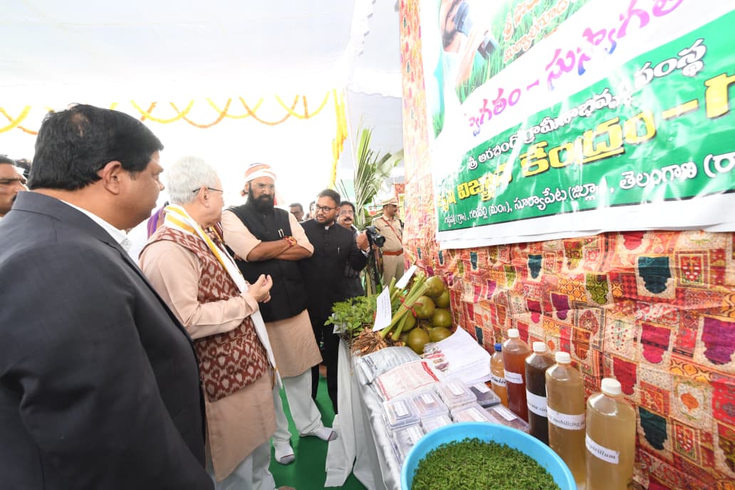 tg_governor's tweet photo. The Hon’ble Governor of Telangana, Shri Jishnu Dev Varma, visited the exhibition stalls set up at the Sri Lakshmi Narasimha Swamy Temple premises at Matapalli in Suryapet District. The exhibition highlighted initiatives related to natural farming practices, agricultural development, women self-help groups, and various welfare and development programmes implemented by different government departments.

During the visit, the Hon’ble Governor interacted with farmers, women self-help group members, and departmental officials, and appreciated the efforts aimed at promoting sustainable agriculture, rural livelihoods, and inclusive development. He lauded the role of women self-help groups in strengthening the rural economy and encouraged greater community participation in such initiatives.

On the occasion, Shri N. Uttam Kumar Reddy, Hon’ble Minister for Irrigation & CAD and Food & Civil Supplies, and Shri Adluri Laxman Kumar, Hon’ble Minister for Scheduled Castes Development and Tribal Welfare Departments, accompanied the Hon’ble Governor. Senior officials of the district administration, temple authorities, and other dignitaries were also present during the visit.