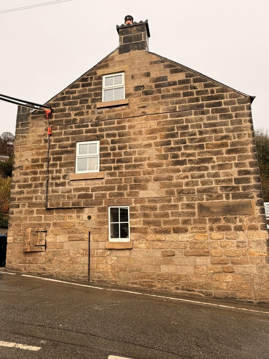 Repair and repointing complete plus the removal of the harsh render to the base of the wall