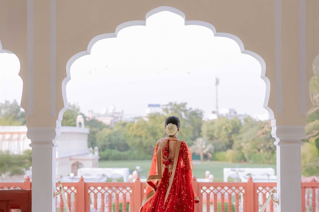 Where childhood dreams meet timeless royalty. ✨
A bride, a palace, and a moment she’s dreamed of forever—unfolding beautifully at Jai Mahal Palace.
Some love stories are meant to be lived like a fairytale.

Image Credit : @israniphotography