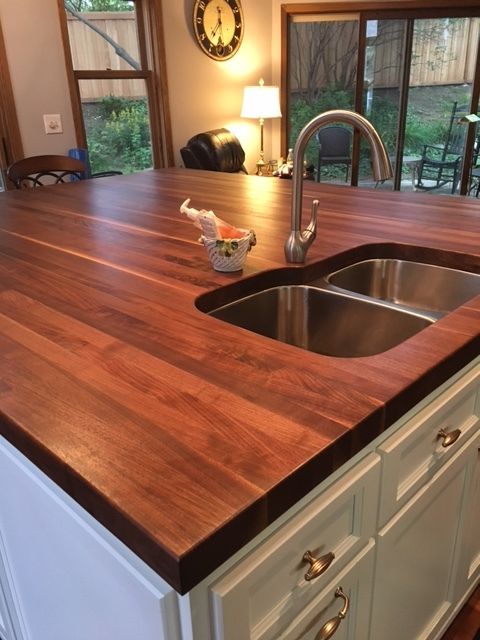 We still make beautiful wood countertops and butcher-block islands at McClure Tables. We do not promote our butcher block business much, but it is still something we can do, especially if you need something unique,e like this. Give us a call at 616-662-5974