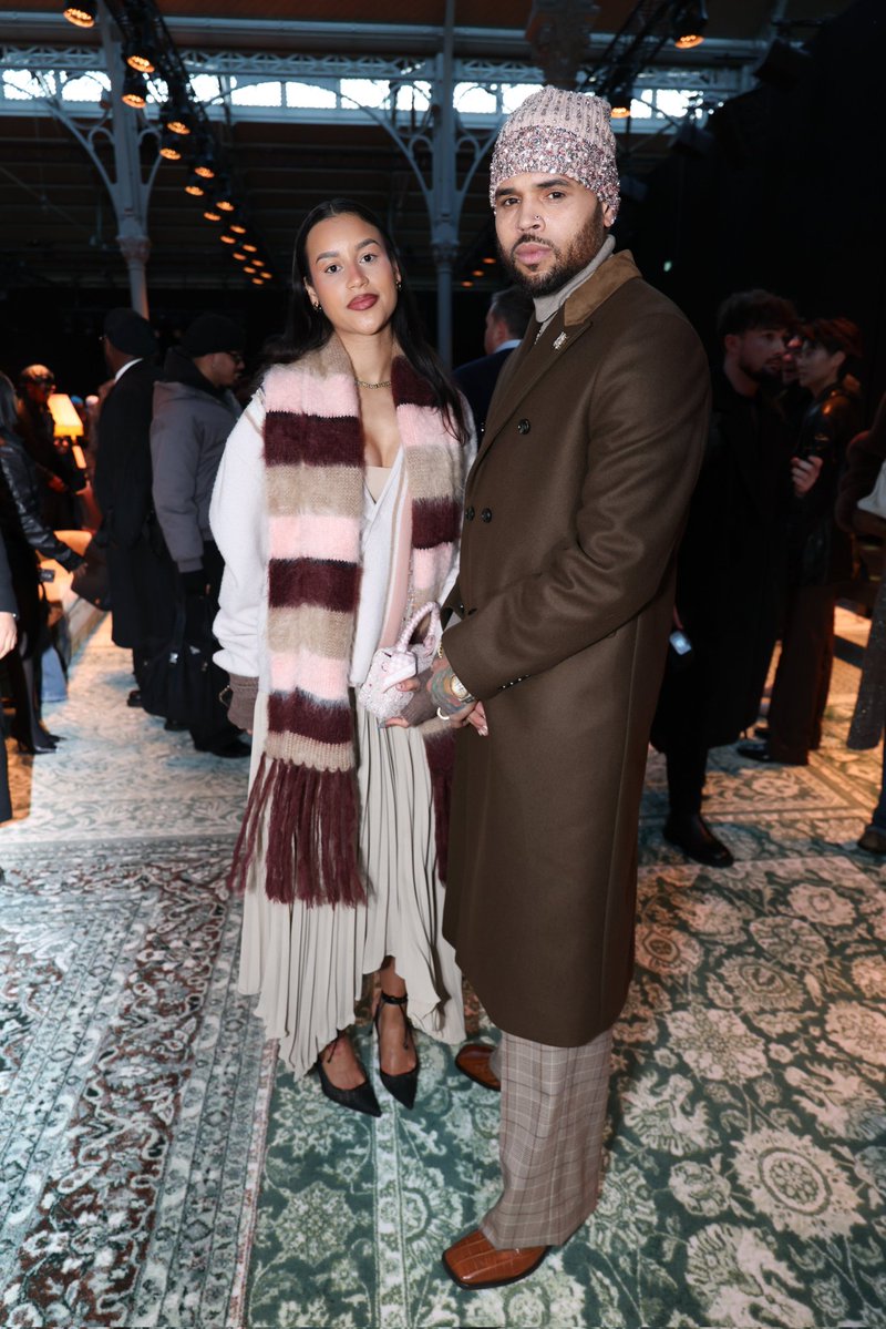 Chris Brown and Jada Wallace attend the AMIRI Fall/Winter 2026 show at Paris Fashion Week.