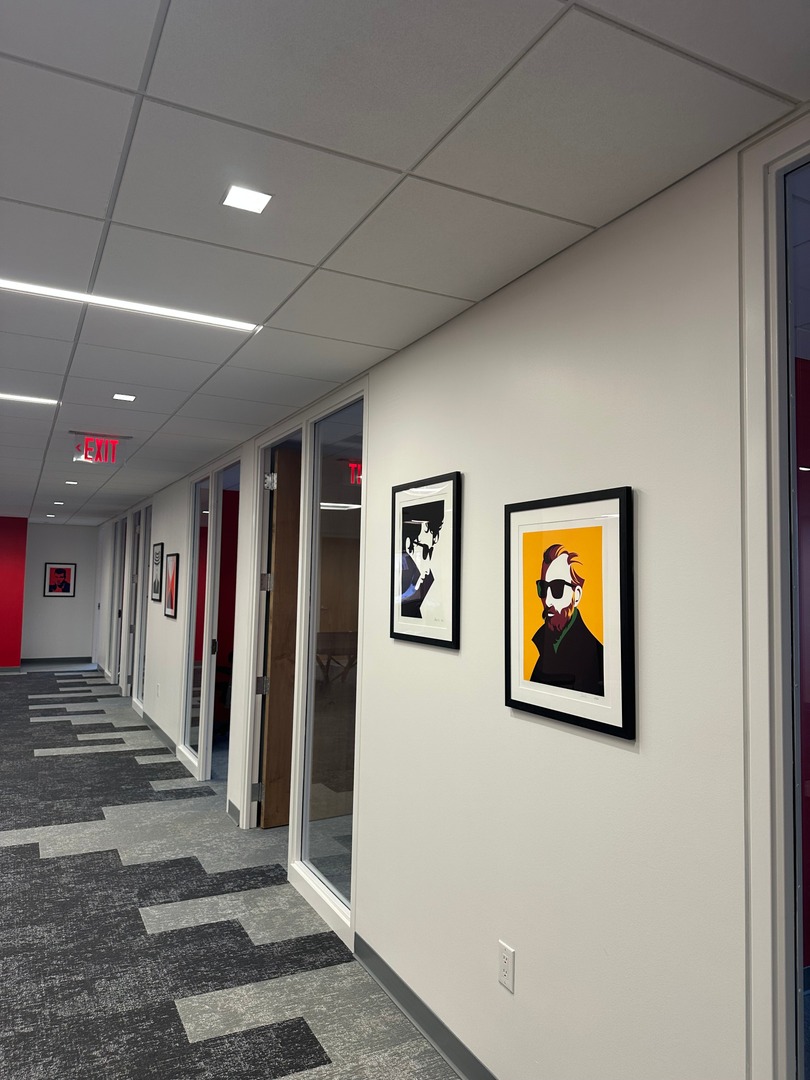 TheWeaponry's tweet photo. Our office walls got a refresh! Hooks in place and artwork by @malikafavre. https://t.co/CjIr7uXJSA