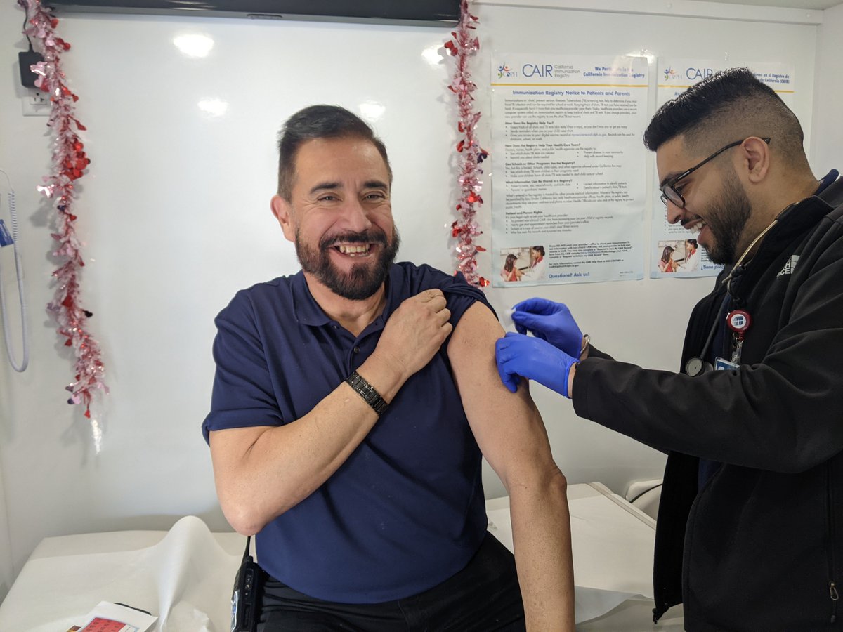 Our principal, Mr. Santos, bravely gets the first Flu Shot today! Thank you <a href="/SaintAgnesNews/">Saint Agnes</a> for visiting Phoenix, they'll be here until 3:30 pm to help support the health of our community!