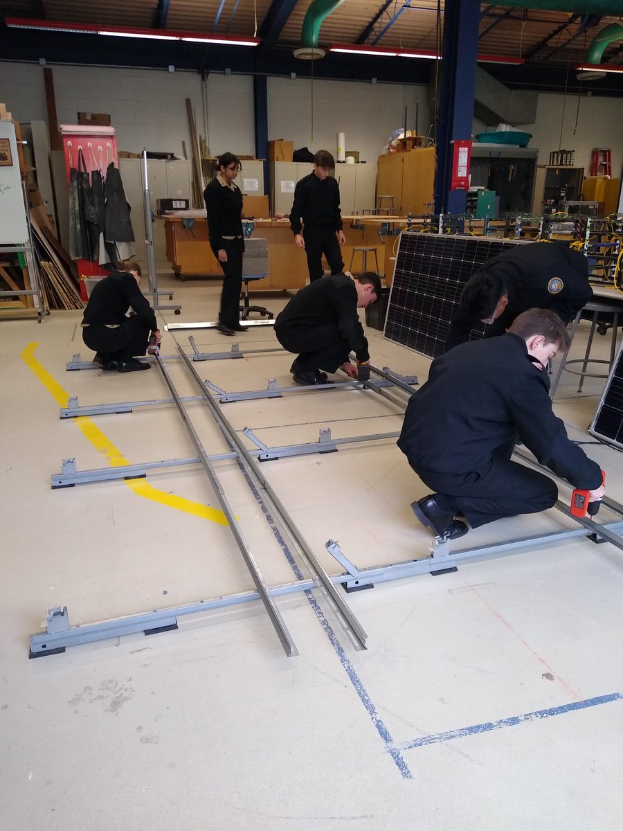 SysEngII's tweet image. Systems Engineering Juniors get training in commercial solar panel installation. Good for the resume. Could be a good summer job. Congrats Juniors.