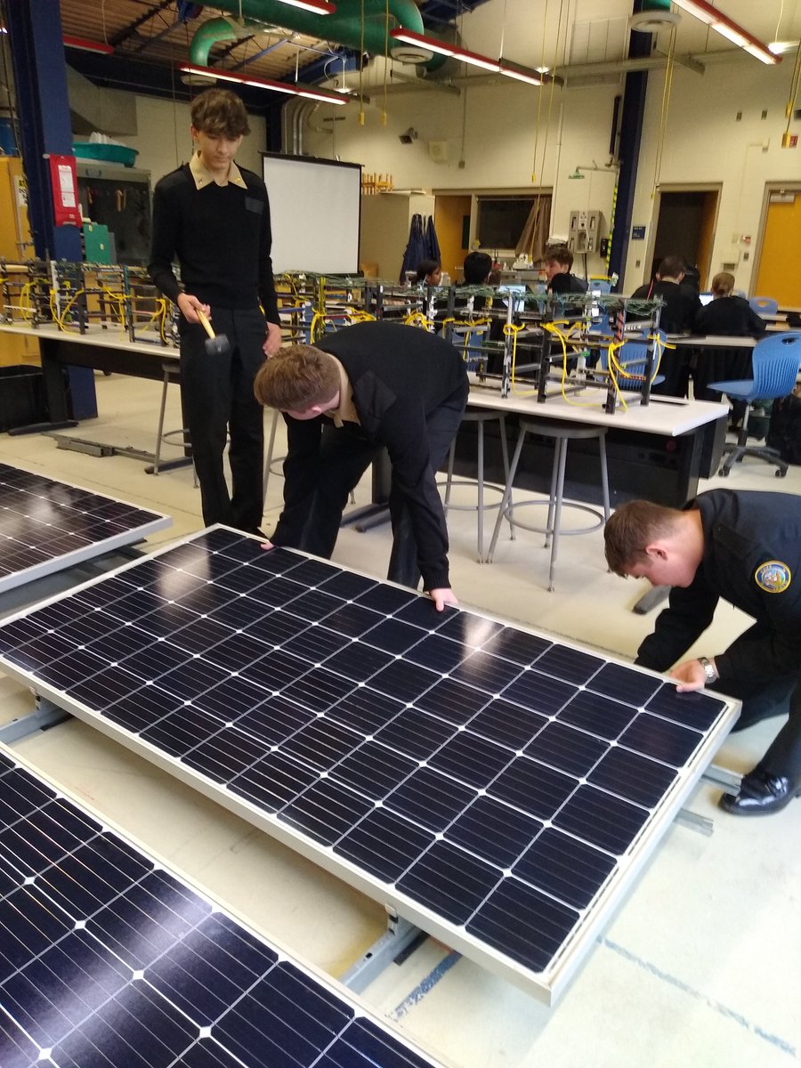 SysEngII's tweet image. Systems Engineering Juniors get training in commercial solar panel installation. Good for the resume. Could be a good summer job. Congrats Juniors.