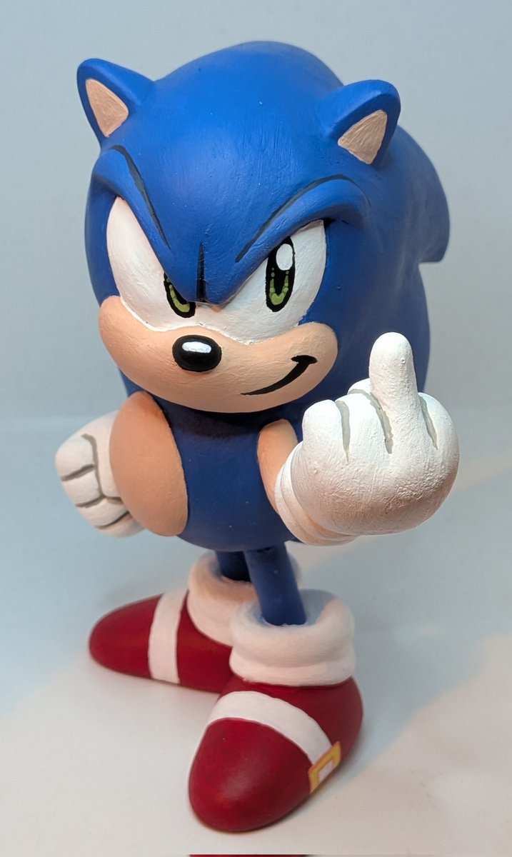 I sculpted a new spiky blue boy with attitude. This time I gave him swappable hands for some extra attitude.
