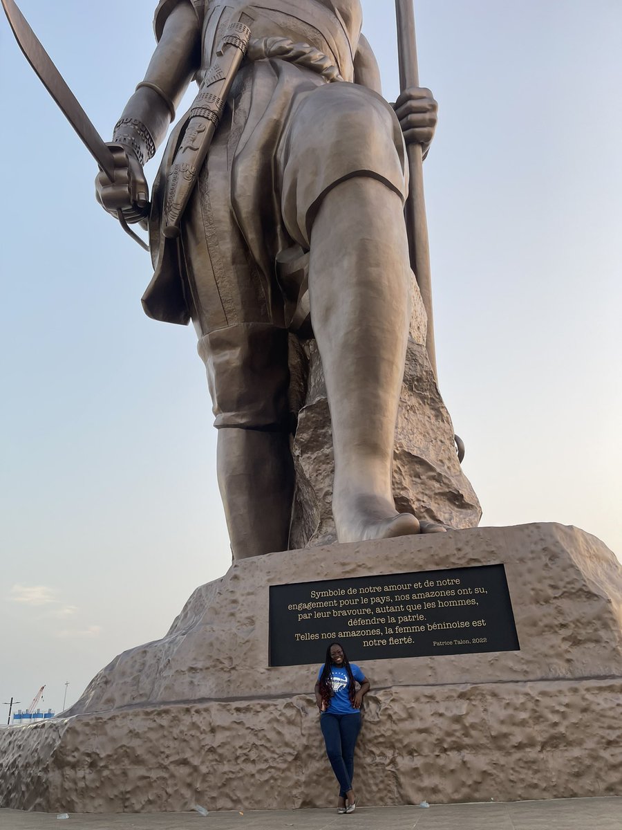 Dr_nuellie_'s tweet photo. Oh look who’s by that statue? Me!😁😅 It’s a statue of the female warriors the movie “The Woman King” is based on. It’s an absolutely glorious sight😍 https://t.co/8tuuSgzglN