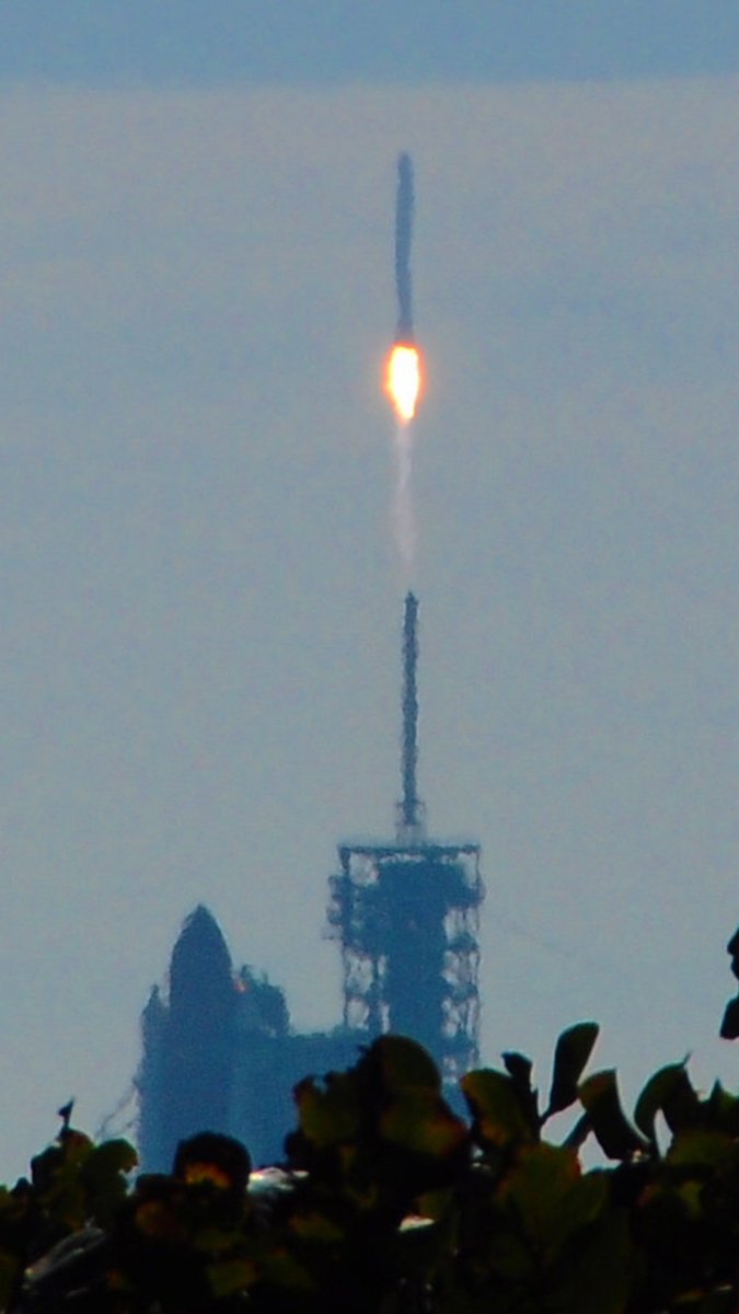 I love this photo of the Space Shuttle and Falcon 9