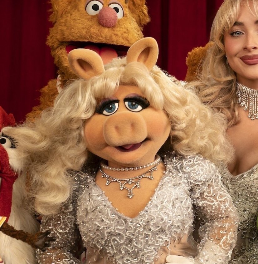 __Colbert's tweet image. Piggy is finally free from straight hair jail