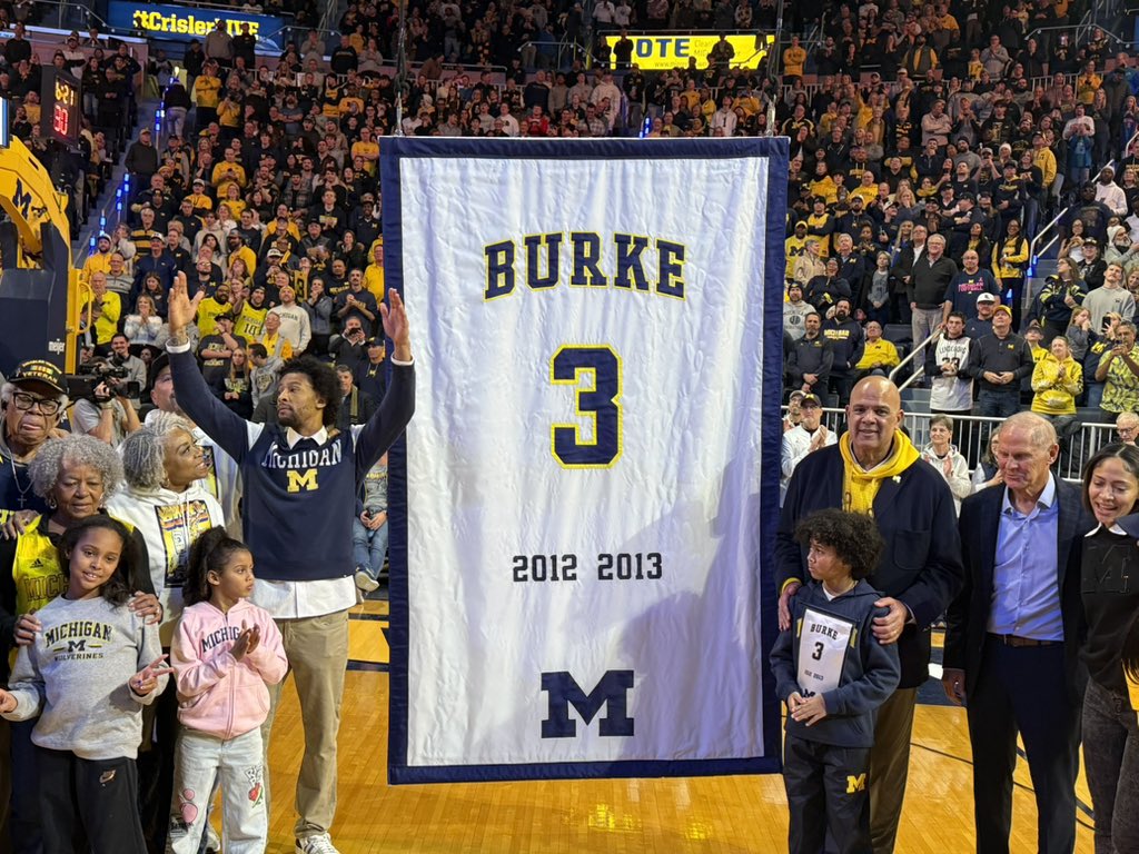RealTonyGarcia's tweet photo. Trey Burke blows kisses to the crowd just seconds before his jersey hangs in Crisler for the rest of time. https://t.co/YyWy6Z5eJy