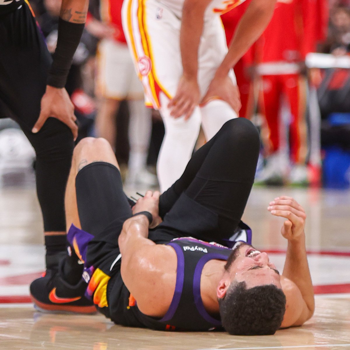 PHNX_Suns's tweet image. Devin Booker officially has a right ankle injury and left the locker room after the game on crutches, per Jordan Ott. 

(Via @DuaneRankin)
