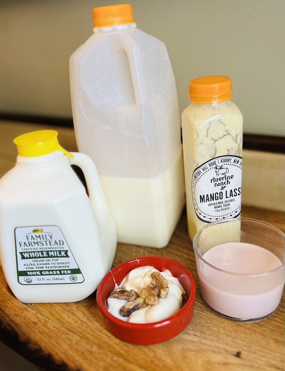 Some local treats for #DairyJanuary. raw milk, A2 cream top, water buffalo lassi, thick PA yogurt with walnuts. Pink drink is raw milk with raspberry syrup from my freezer.