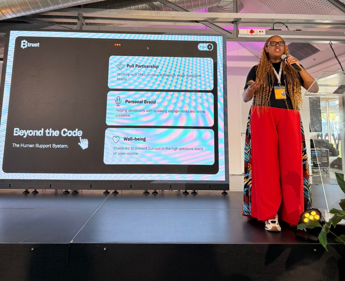btrustteam's tweet photo. What does it take to sustain open-source development in Africa and the Global South?

Earlier today, @Murugi___ shared her insights on the important, and often unseen, work happening across the ecosystem.

What many don’t see is the human layer of Bitcoin: the developers, reviewers, maintainers, and community builders whose work keeps the network resilient.

She also highlighted how developers help turn Bitcoin from a protocol into usable, everyday experiences like wallets, self-custody tooling, and the products people actually interact with.

That's why decentralization can't stop at the code. We need builders from more places, especially those who understand local realities and struggles, shaping the tools that bring Bitcoin to the next billion users.

We’re proud to support this work by creating sustainable pathways for contributors and strengthening the ecosystem.

#abct26