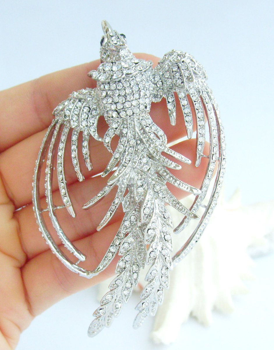 Introducing our gorgeously designed phoenix brooch! Featuring exquisite crystals. Perfect for your outfit, jacket, scarf, necktie, or even a hat. Thanks to the hook of the back that can be use as a pendant too. etsy.com/listing/430803… #PhoenixBrooch #AnimalBrooch #CostumeJewelry
