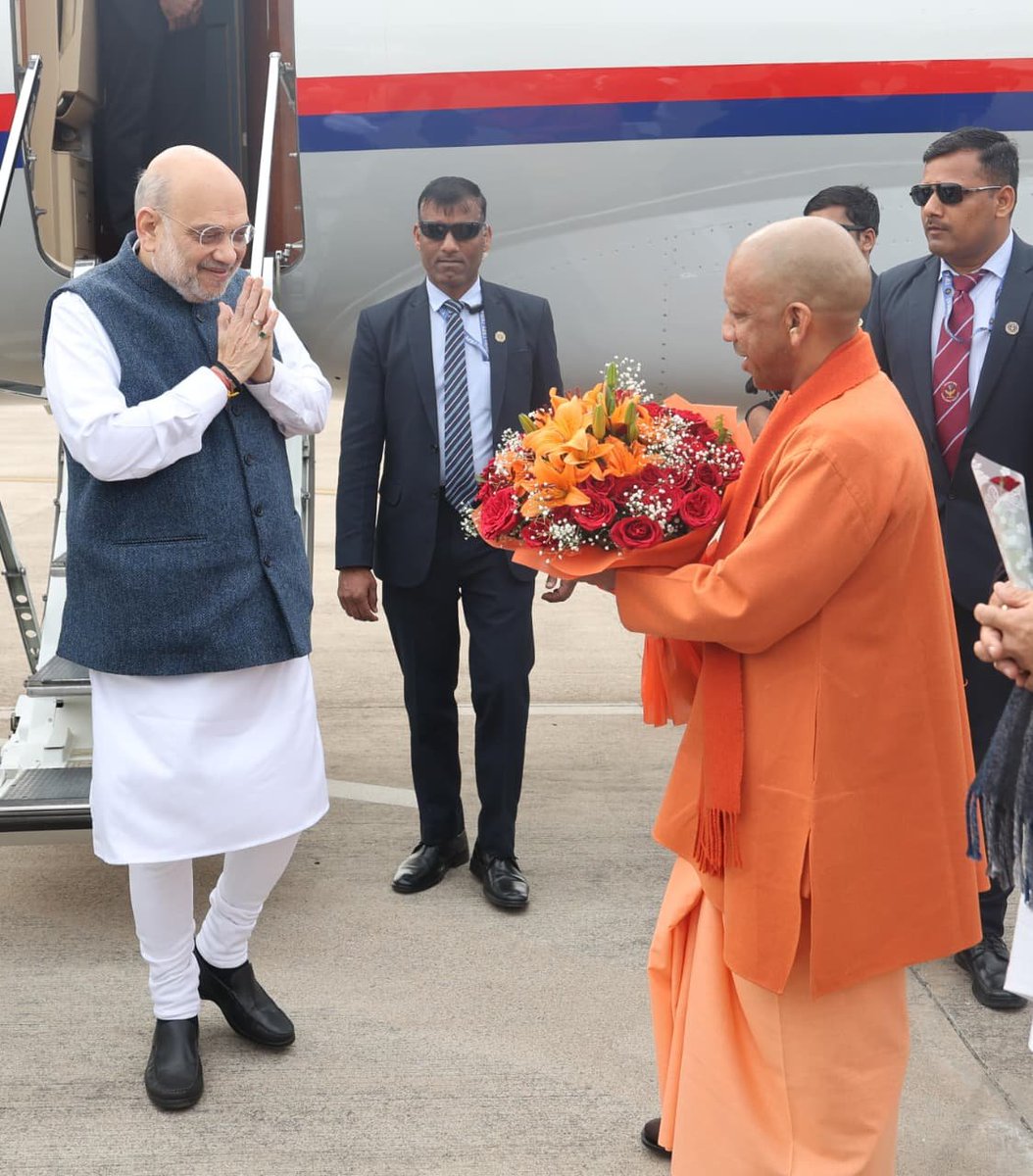 ANI's tweet photo. Union Home Minister Amit Shah arrives in Lucknow for Uttar Pradesh Day celebrations. CM Yogi Adityanath receives him. 

(Pics: UP Information Department) https://t.co/Ru7wvMiYcg