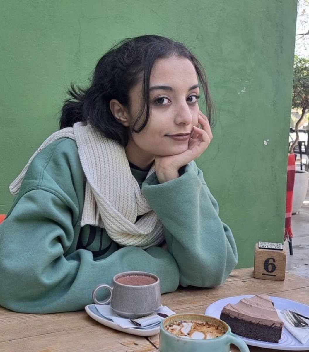 IranReporters's tweet photo. Faeze Mostan, 20, was shot and killed by Iranian regime forces. Images captured by her family show’s the moment she died from her injuries while being held by her mother. https://t.co/tqVWLGgFIG