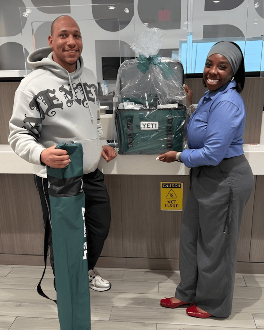 InsidePFCU's tweet image. 🎉 Winner alert! 

Kasib Parham was selected from the new Glenside Branch accounts to win a $1,000 Ultimate Tailgate Package. Presented by Branch Manager Tiffini Fisher-Diakite. Thank you to everyone who participated! 🧡

 #PFCU #Winner