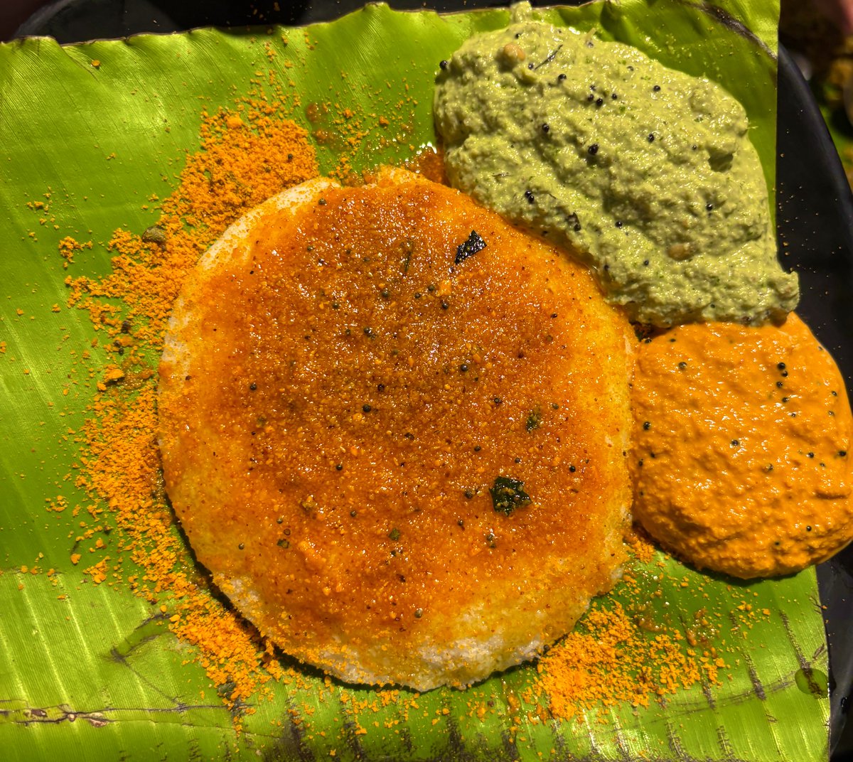 DealsDhamaka's tweet photo. The Rameswaram Cafe ☕️ @ 12.47 AM

Too much chaos for a brilliant dosa.

> 300+ people even at 12 AM
> We Ordered 10+ items for 8 people
> Too chaotic pick-up experience, had to pickup 4-5 times for these items

FOOD 🍛? 
> DOSA was toooo goood, out of the park item. Also liked their POORI
> The sambar idli was cold, not at all worth it. Tatte idli was good 
> Rasam Wada was okay, Pune has better rasam Wada in other places
> Gongura rice and Pongal was okay. May be since South Indians ourself, we prepare better versions at home
> Sheera was decent & the FILTER COFFEE was tooo good

About the place & Experience 

> Chaotic chaotic chaotic - not meant to handle such crowds, they haven’t planned it yet 
> Atleast 2/10 folks have chutneys spilled on them due to crowd and movement (including me 🥲) 
> No seating space, people were standing, sitting where possible and eating. But this was expected, hence not a problem 
> Rude people, there were no tissues around, when asked thrice the person at counter said - will be somewhere go find yourself 😂😂😂 that’s too after making Rs.2000 bill 

I like their dosa, but won’t visit again for next few months. Prefer to eat in cleaner, silent place where I can enjoy the food. Don’t get me wrong, I had food at many buzzing places, and still do - but the Pune outlet of this Rameswaram cafe didn’t live upto hype …