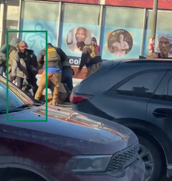 OAlexanderDK's tweet photo. The officer in the grey jacket enters the altercation unarmed, reaches over the man as others hold him down and then walks away with a pistol in his hand. 

It appears that this officer managed to disarm the suspect prior to the first shots. https://t.co/kQD4oO3GSR