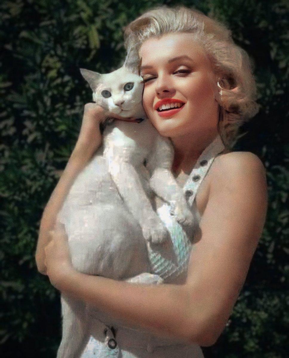 Marilyn Monroe showing that diamonds aren't the only things that are a girl's best friend.