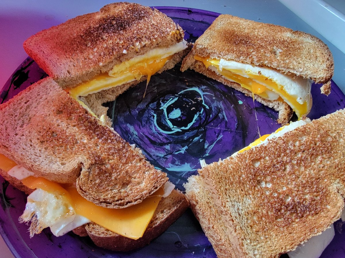EmplehVT's tweet image. Egg sandwiches on toasted bread with sharp cheese and some garlic powder to prove i remember to eat breakfast sometimes.