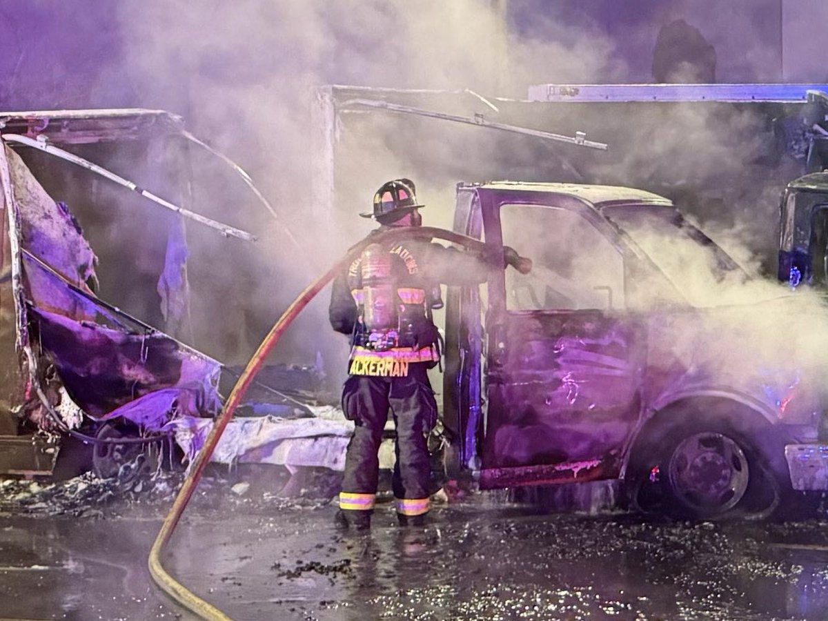 TMFPD's tweet image. Early this morning in Spanish Springs, #TMFR Firefighters quickly knocked down a fire involving two cargo (U-Haul) trucks that were fully involved upon arrival. The fire’s exposure also damaged a third U-Haul. no injuries reported and cause is under investigation.