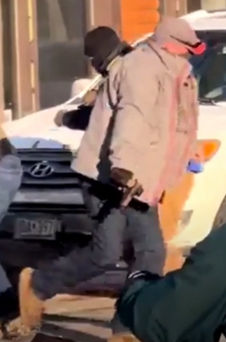 sentdefender's tweet image. Clearer image shows that the firearm removed from the scuffle by an agent prior to the shooting in Minneapolis was almost definitely the victim’s Sig P320, meaning he was unarmed when shot by agents with Border Patrol and Immigration &amp;amp; Customs Enforcement (ICE).