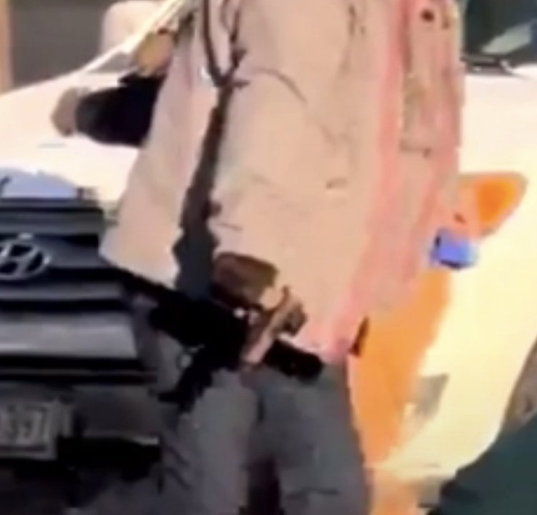 This is ICU nurse Alex Pretti's legally owned and carried handgun in the hand of an ICE agent before Pretti was ever shot.

This agent took the gun out of Pretti's waist-ban, and seconds later Pretti was shot and killed.

Pretti NEVER pulled the gun. He was legally carrying it.