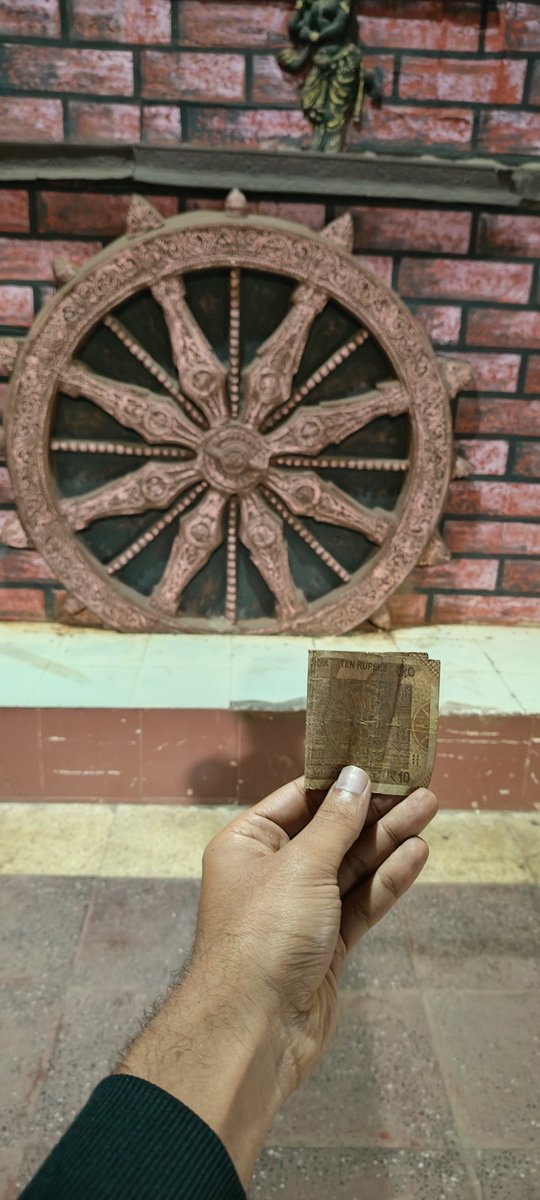 shivakumar9495's tweet photo. Hey @grok make sure to visible the ahsoka chakra on the 10 rupees holding in my hand https://t.co/Pc3zbsdYNY