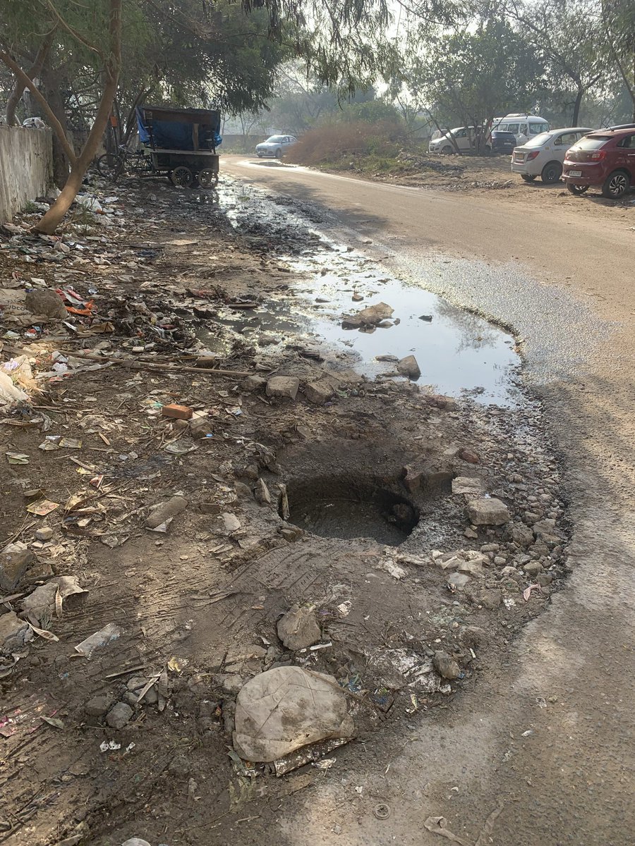 sbindia77's tweet photo. @gupta_rekha @CMODelhi @PMOIndia @HMOIndia @narendramodi @AmitShah @SwachhBharatGov  open manhole in Dwarka Sec 9 Toganpur. Another tragedy awaited.  @MCD_Delhi is least bothered to clear the sewerage as dirty unhygienic water flows on the road. https://t.co/YnX8I2wvQA